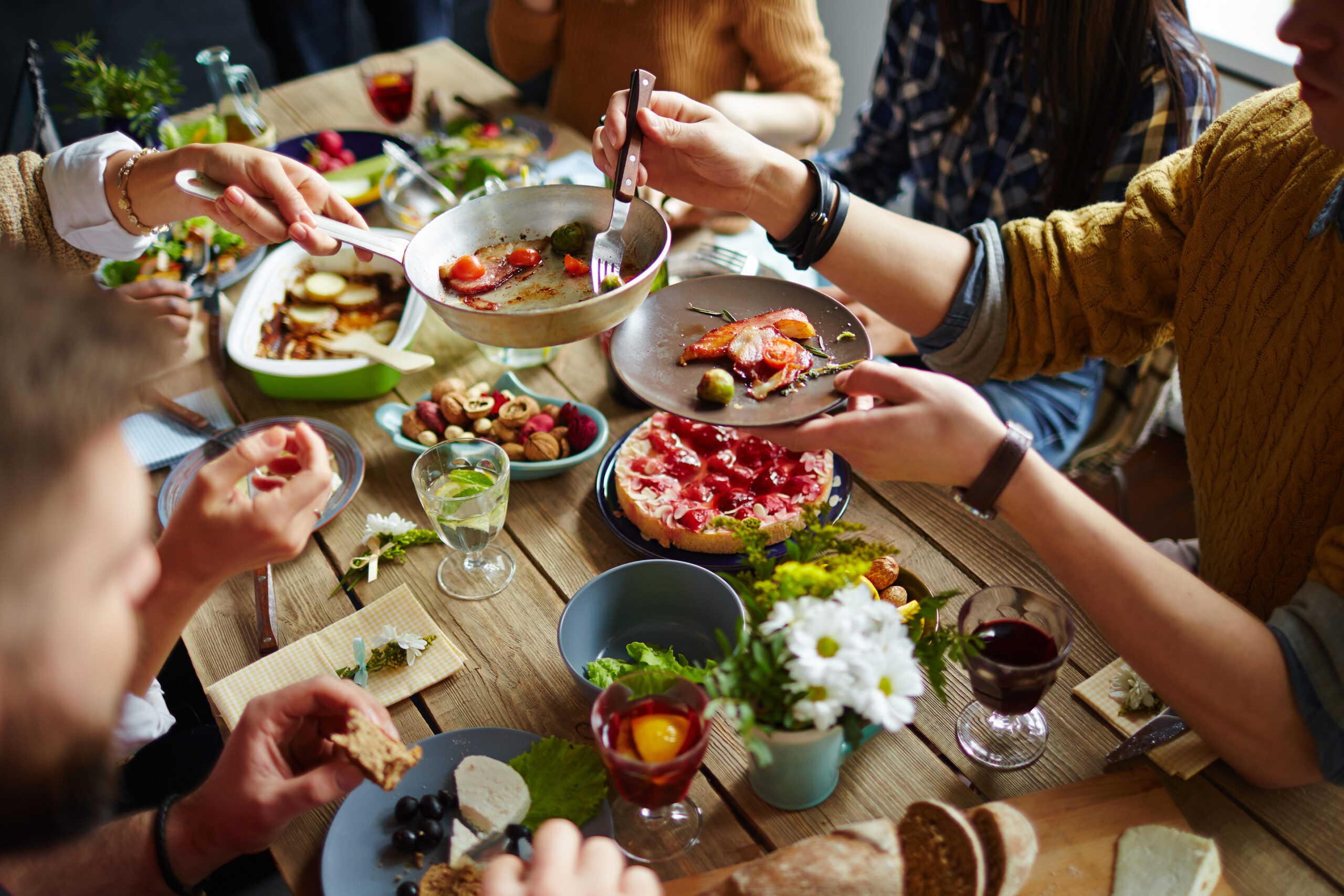 Friends share a meal at Tapas