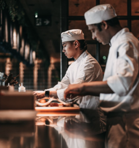 Photo of CLAP's chefs making food.